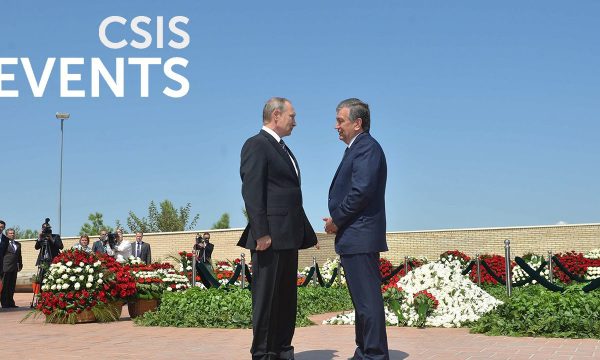 Photo of Vladimir Putin and Islam Karimov speaking outdoors