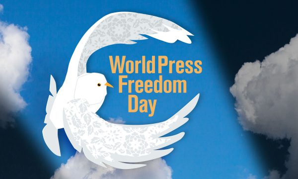 Sky and clouds in the background and an illustration of a dove in the foreground, World Press Freedom Day logo